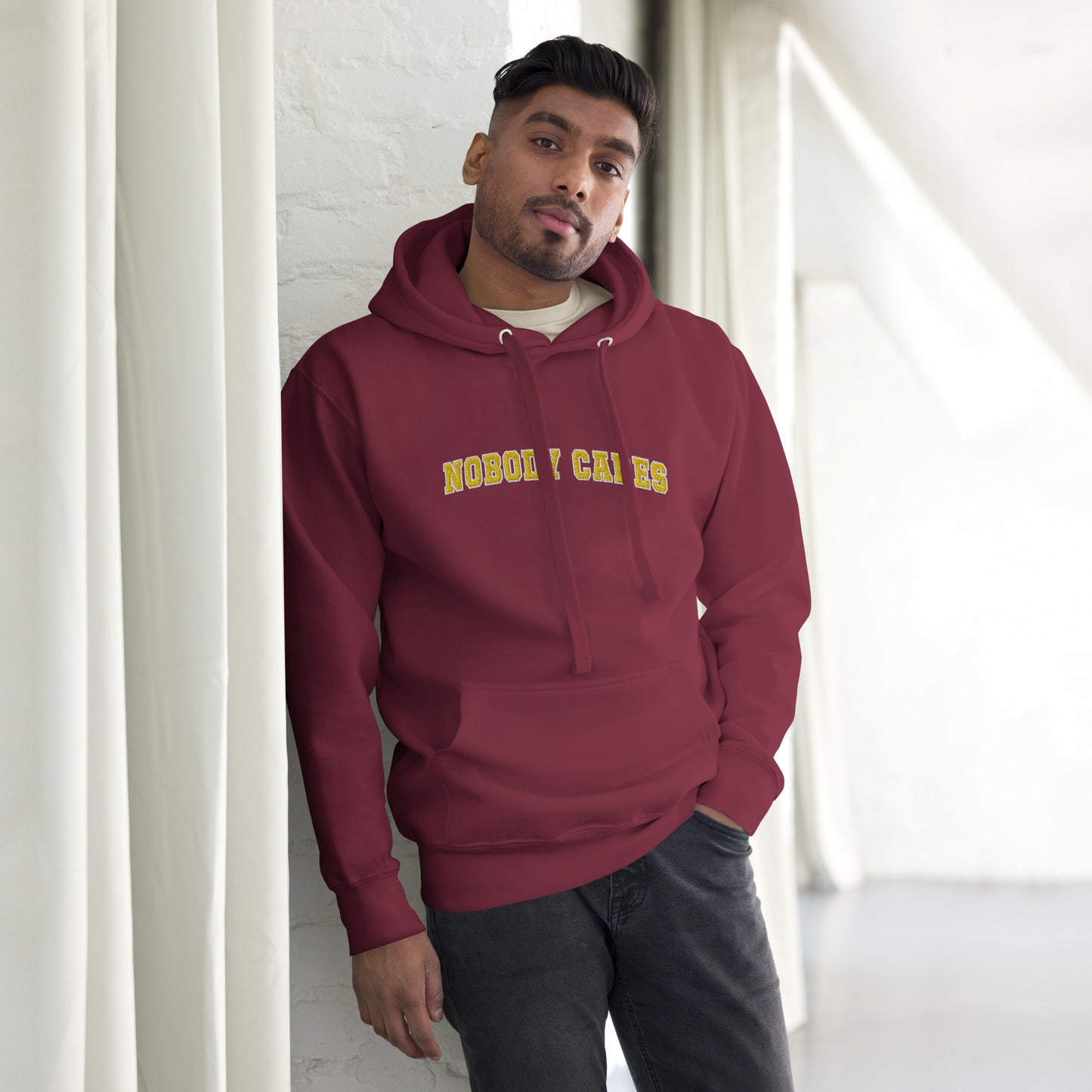 Nobody Cares - Unisex Hoodie in Maroon + Gold